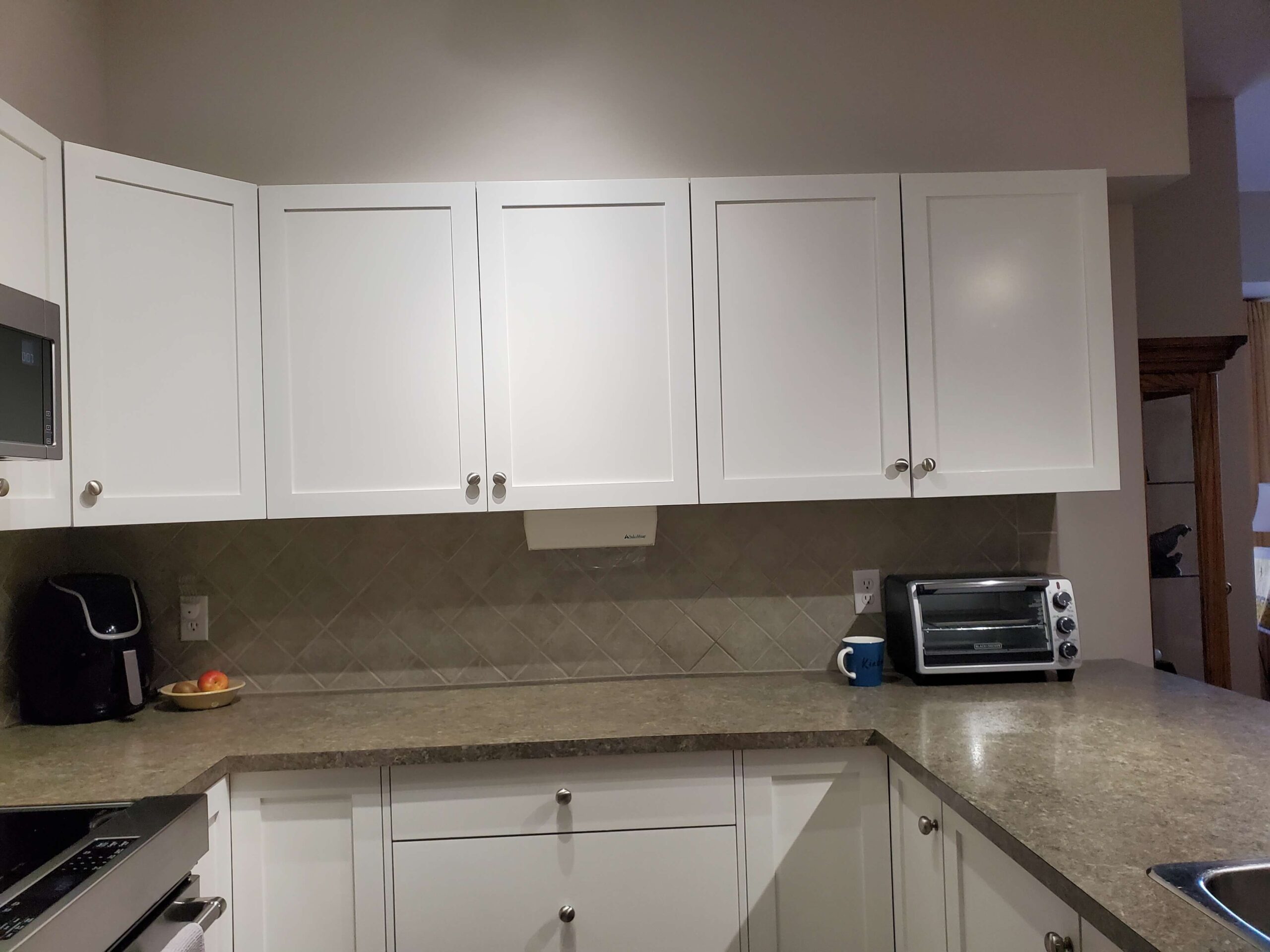 white cabinet and countertop renovation
