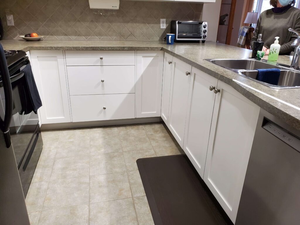 light tan tiled kitchen floor